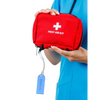 Diabetic luggage tag attached to a red first aid kit, showcasing clear identification for travelers with diabetes.
