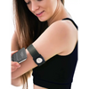 Dexcom G7 grey adjustable armband with rotating clip on woman's arm.
