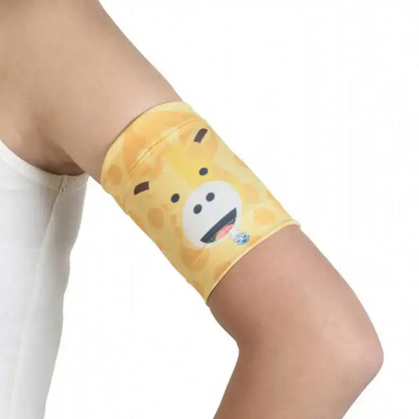 Blood Glucose Sensor Armband for Children - Fauna & Flora design, featuring a yellow giraffe print, worn on a child's arm.