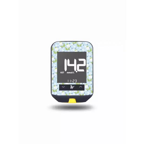 Freestyle Optium Neo glucose meter with spring floral decorative sticker cover, water-resistant and easy to apply.