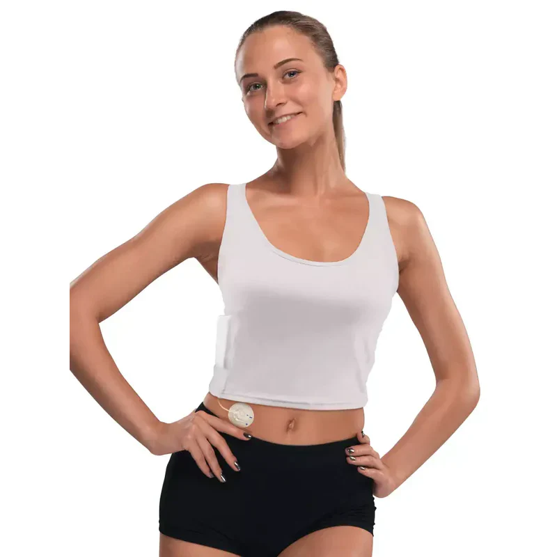 woman wearing white insulin pump crop top with integrated pocket for discreet and comfortable insulin pump support Image