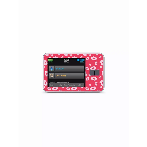 Tandem t:slim insulin pump with Valentine's Day themed pink heart patterned waterproof sticker