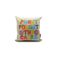Diabetes awareness pillow cover with colorful "Donut Forget the Carbs" design.