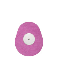 FreeStyle Libre 2 drop shape patch in pink solid color, breathable adhesive patch to help support sensor wear