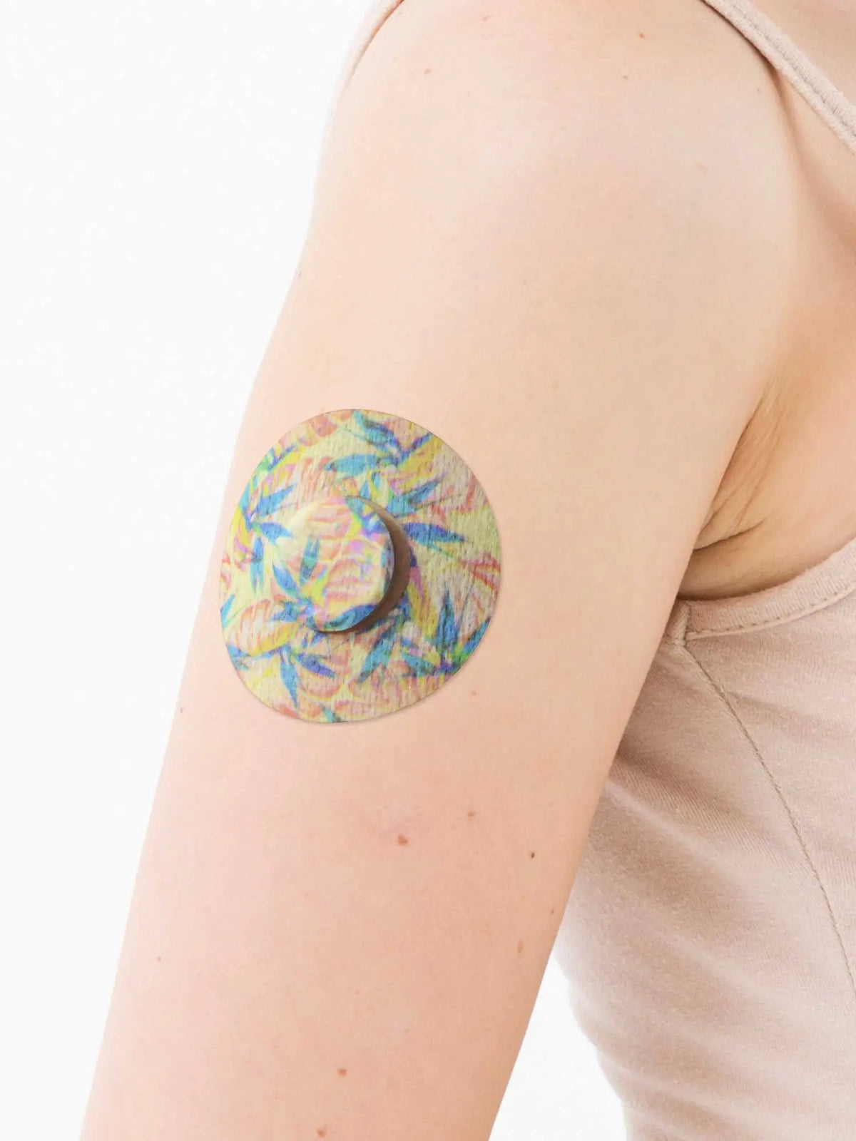 Plaster til FreeStyle Libre 3, design Tequila Sunrise, på armen