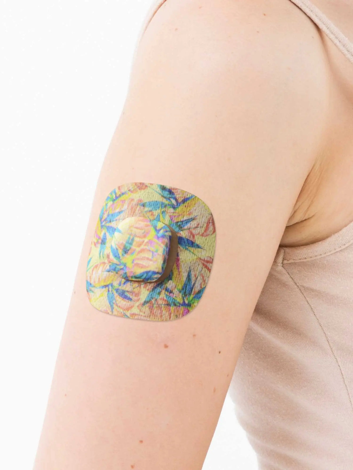 Plaster til Simplera Sync, design Tequila Sunrise, på armen