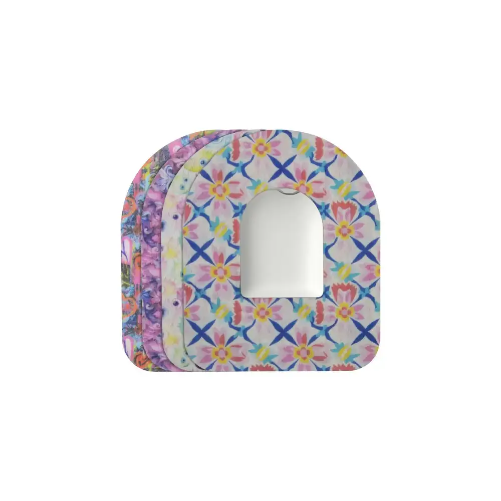 Omnipod Dash adhesive patches in vibrant spring designs for secure insulin pump placement.