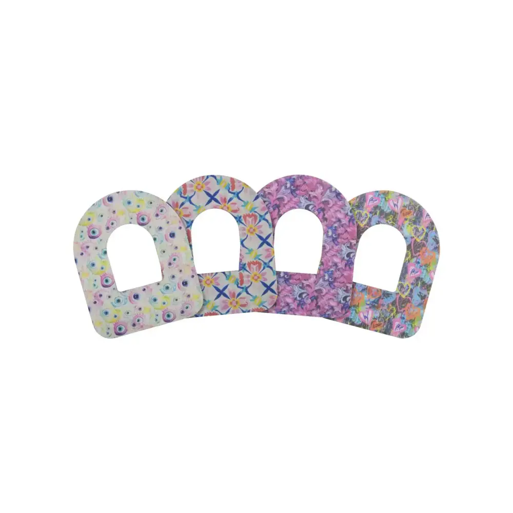 Omnipod Dash patches with spring floral designs for insulin pumps.