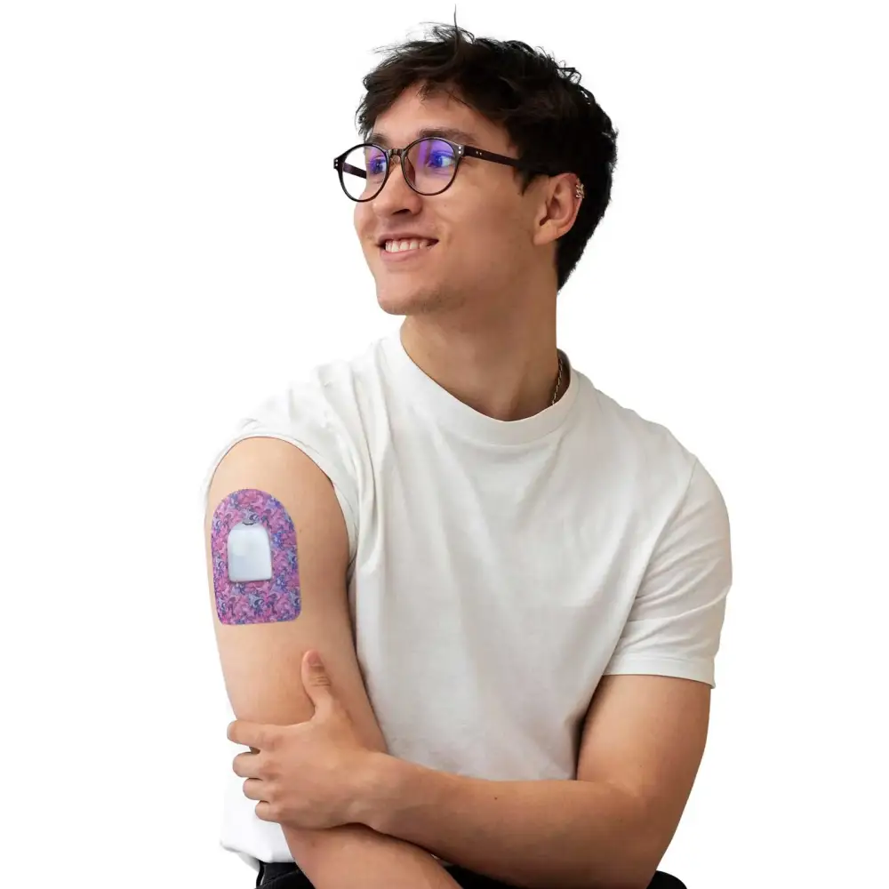 Omnipod Dash Patch with vibrant spring design applied on male arm.