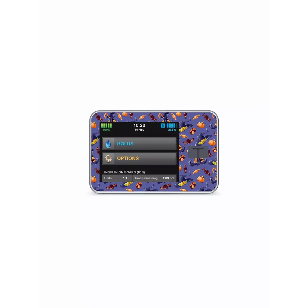 Tandem t:slim Insulin Pump with Halloween-themed stickers, showcasing festive designs.