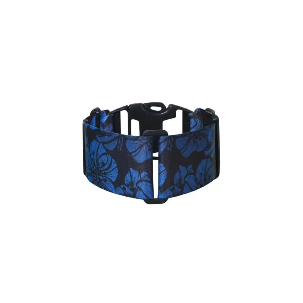 Insulin pump leg band with floral print for discreet wear under clothes.