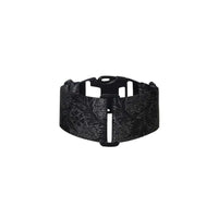 Black elastic Dia-Leg Band for discreet insulin pump use under clothing.
