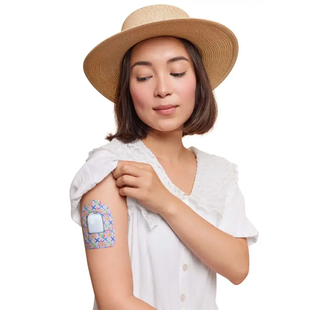 Omnipod Dash Patch with colorful spring design on upper arm, providing secure and comfortable hold for insulin pump.