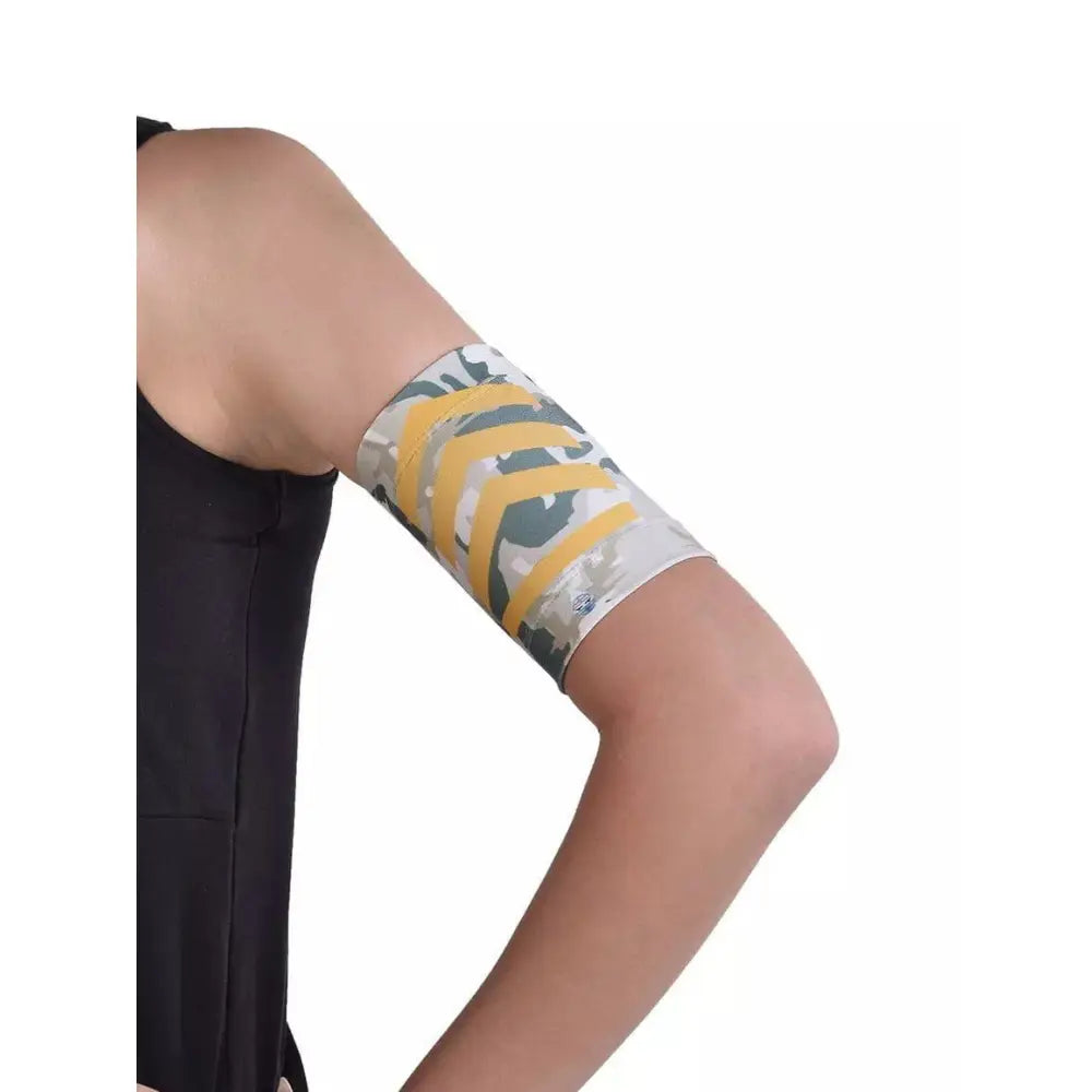 Armband for kids holding blood glucose sensor; colorful, stretchy, secure fit for active use.