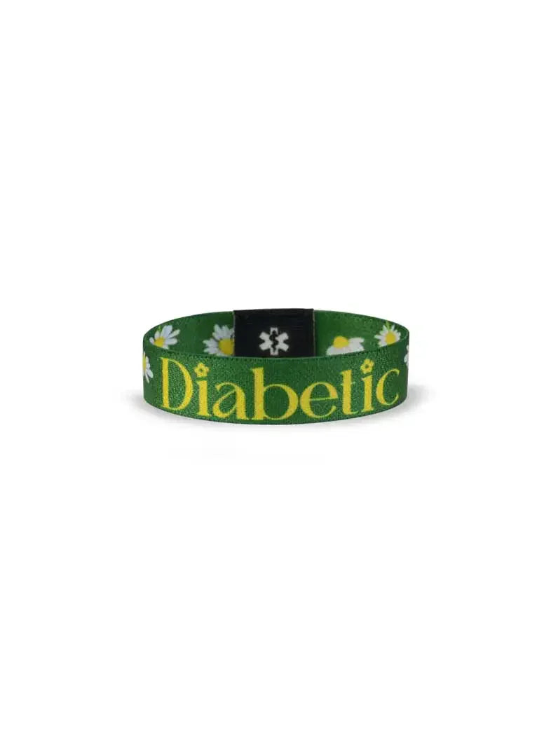 Reversible Type 1 Diabetes Awareness Wristband for Children with daisies, "Diabetic" text, green background.